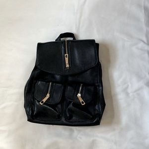 Black Leather Backpack with Zipper Design
